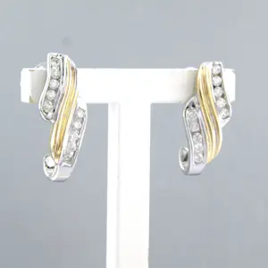 14k bicolour gouden oorknoppen bezet met briljant geslepen diamant tot. 0,20ct kopen? Bied vanaf 410!