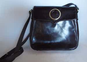 Niet of onleesbaar gesigneerd - Vintage bruin leren Crossbody Bag van Claudio Ferricci verkocht voor € 10!