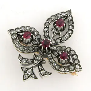 18k gouden broche bezet met robijn en diamant kopen? Bied vanaf 1200!