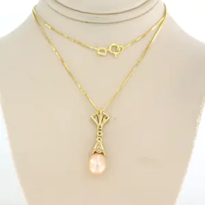 14k gouden collier en hanger met parel en single cut geslepen diamant tot.0.20ct kopen? Bied vanaf 280!